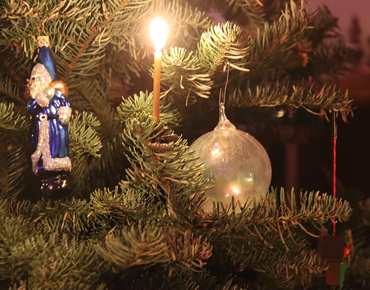 Close up of santa and bulbs